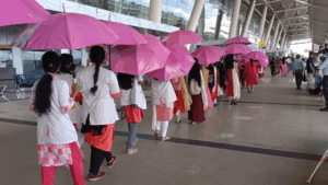 Pink Umbrella Walk at Chennai Airport