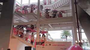 Pink Umbrella Walk at Chennai Airport