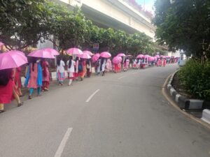 Pink Umbrella Walk at Chennai Airport