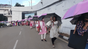 Pink Umbrella Walk at Chennai Airport