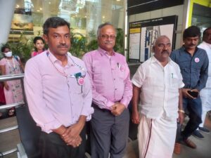 Pink Umbrella Walk at Chennai Airport